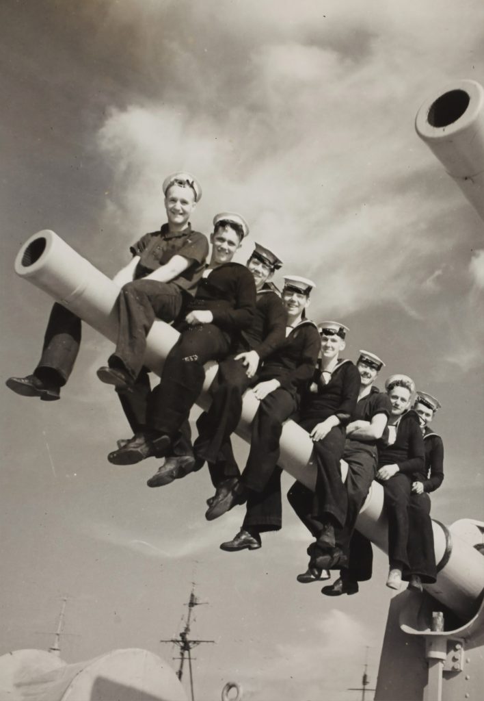 Photos of sailors sitting on guns were quite often back in the day